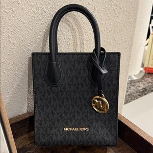 Michael Kors Black Mini Bag with Gold Accents